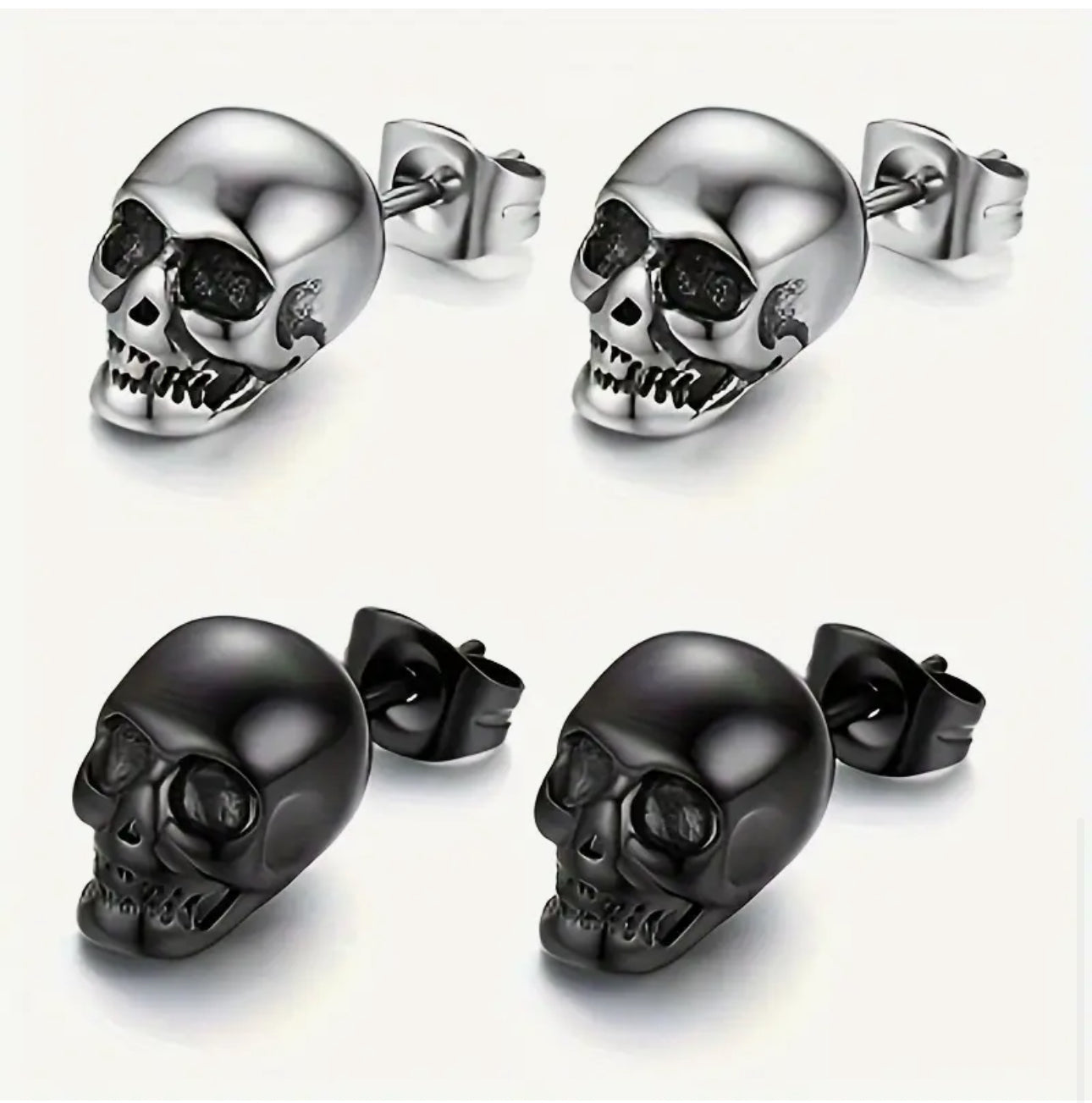 2 pairs of Skull Stud Earrings Skulls. 1 Pair Black, 1 Pair Silver. Stainless Steal Earrings. Unisex Punk Gothic Earrings.